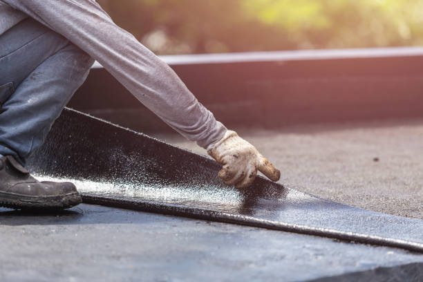Professional Basement Waterproofing technician working in Wilkinson, IN